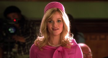 Movie still from “Legally Blonde 2: Red, White & Blonde” (2003), directed by Charles Herman-Wurmfeld – A woman wearing a pink outfit and a pink hat; Close Up shot, Low angle