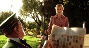 Movie still from “Legally Blonde 2: Red, White & Blonde” (2003), directed by Charles Herman-Wurmfeld – A man and a woman talking in a garden; Medium shot, Over the shoulder angle