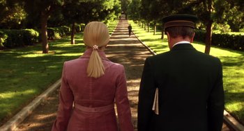 Movie still from “Legally Blonde 2: Red, White & Blonde” (2003), directed by Charles Herman-Wurmfeld – A man and a woman walking down a path in a park; Medium shot, Over the shoulder angle