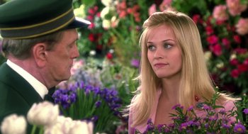 Movie still from “Legally Blonde 2: Red, White & Blonde” (2003), directed by Charles Herman-Wurmfeld – A man and a woman talking in a flower shop; Close Up shot, Over the shoulder angle
