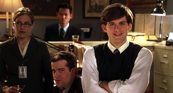Movie still from “Legally Blonde 2: Red, White & Blonde” (2003), directed by Charles Herman-Wurmfeld – A group of young men sitting at a table; Medium shot, Over the shoulder angle