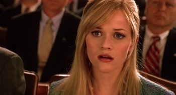 Movie still from “Legally Blonde 2: Red, White & Blonde” (2003), directed by Charles Herman-Wurmfeld – A person sitting in a chair; Close Up shot, High angle