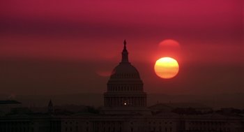 Movie still from “Legally Blonde 2: Red, White & Blonde” (2003), directed by Charles Herman-Wurmfeld – The sun is setting behind the dome of the united states capitol building; Extreme Wide shot, Low angle