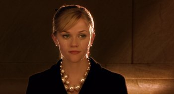 Movie still from “Legally Blonde 2: Red, White & Blonde” (2003), directed by Charles Herman-Wurmfeld – A person wearing a necklace; Close Up shot, Over the shoulder angle