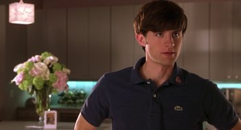 Movie still from “Legally Blonde 2: Red, White & Blonde” (2003), directed by Charles Herman-Wurmfeld – A young man in a blue shirt is looking to his left; Close Up shot, Over the shoulder angle