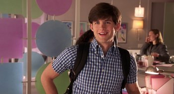 Movie still from “Legally Blonde 2: Red, White & Blonde” (2003), directed by Charles Herman-Wurmfeld – A young man wearing a plaid shirt and a backpack; Medium shot, Over the shoulder angle