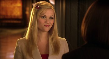Movie still from “Legally Blonde 2: Red, White & Blonde” (2003), directed by Charles Herman-Wurmfeld – A person with long blonde hair; Close Up shot, Over the shoulder angle