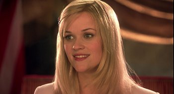 Movie still from “Legally Blonde 2: Red, White & Blonde” (2003), directed by Charles Herman-Wurmfeld – A person with long blonde hair; Close Up shot, Over the shoulder angle