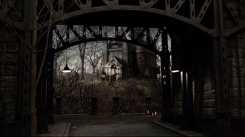 Movie still from “A Series of Unfortunate Events” (2004), directed by Brad Silberling – An image of an abandoned house in the middle of a dark place; Extreme Wide shot, High angle