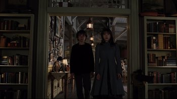 Movie still from “A Series of Unfortunate Events” (2004), directed by Brad Silberling – A couple of people that are standing in a room; Wide shot, Low angle