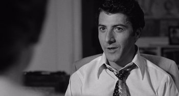 Movie still from “Lenny” (1974), directed by Bob Fosse – Black and white photograph of a man wearing a tie; Close Up shot, Over the shoulder angle