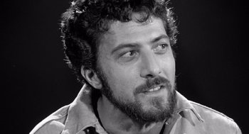 Movie still from “Lenny” (1974), directed by Bob Fosse – Black and white photograph of a man with a beard; Close Up shot, Low angle