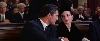 Movie still from “Les Girls” (1957), directed by George Cukor – A man and a woman sitting next to each other; Close Up shot, Over the shoulder angle