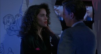 Movie still from “Less Than Zero” (1987), directed by Marek Kanievska – A man and a woman are talking to each other; Close Up shot, Over the shoulder angle