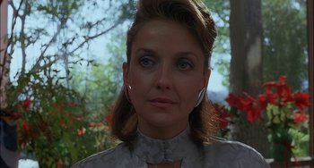 Movie still from “Less Than Zero” (1987), directed by Marek Kanievska – A person wearing a dress; Close Up shot, Low angle