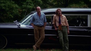 Movie still from “Let's Scare Jessica to Death” (1971), directed by John D. Hancock – A couple of men standing next to each other; Wide shot, Low angle