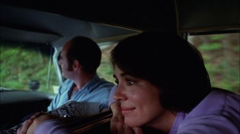 Movie still from “Let's Scare Jessica to Death” (1971), directed by John D. Hancock – A man and a woman sitting in the back of a car; Close Up shot, Low angle