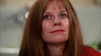 Movie still from “Let's Scare Jessica to Death” (1971), directed by John D. Hancock – A person with long brown hair; Close Up shot, Low angle