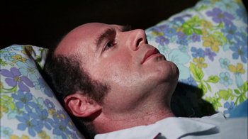 Movie still from “Let's Scare Jessica to Death” (1971), directed by John D. Hancock – A person laying on a bed; Close Up shot, High angle