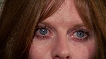 Movie still from “Let's Scare Jessica to Death” (1971), directed by John D. Hancock – A woman's eyes with blue eyes; Extreme Close Up shot, Overhead angle