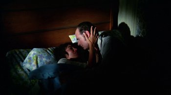 Movie still from “Let's Scare Jessica to Death” (1971), directed by John D. Hancock – A man and a woman laying in a bed together; Close Up shot, Overhead angle