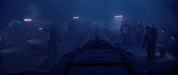Movie still from “Leviathan” (1989), directed by George P. Cosmatos – A view of a train from a train car; Extreme Wide shot, Low angle