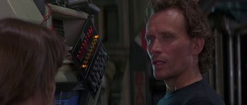 Movie still from “Leviathan” (1989), directed by George P. Cosmatos – A person in front of an electronic device; Close Up shot, Over the shoulder angle