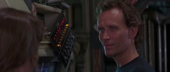 Movie still from “Leviathan” (1989), directed by George P. Cosmatos – A person near a computer keyboard; Close Up shot, Low angle