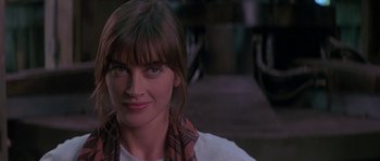 Movie still from “Leviathan” (1989), directed by George P. Cosmatos – A person wearing a scarf; Close Up shot, Over the shoulder angle