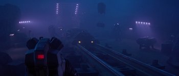 Movie still from “Leviathan” (1989), directed by George P. Cosmatos – A train on the tracks at night in the fog; Extreme Wide shot, High angle
