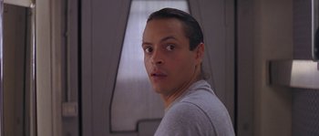 Movie still from “Leviathan” (1989), directed by George P. Cosmatos – A person looking at the camera; Close Up shot, Low angle