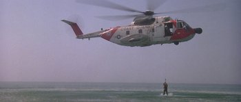 Movie still from “Leviathan” (1989), directed by George P. Cosmatos – A coast guard helicopter flying over the ocean; Extreme Wide shot, Low angle