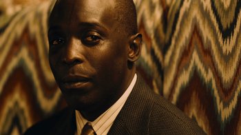 A person wearing a suit and tie