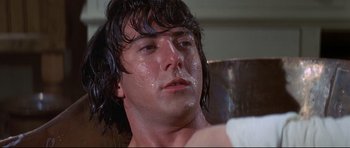 Movie still from “Little Big Man” (1970), directed by Arthur Penn – A person with wet hair; Close Up shot, Low angle