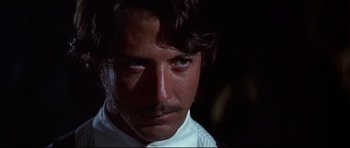 Movie still from “Little Big Man” (1970), directed by Arthur Penn – A person wearing a white shirt; Close Up shot, Low angle