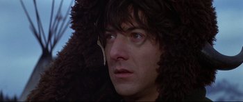Movie still from “Little Big Man” (1970), directed by Arthur Penn – A person wearing a fur coat; Close Up shot, Low angle