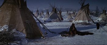 Movie still from “Little Big Man” (1970), directed by Arthur Penn – Many teepees in the snow; Wide shot, High angle