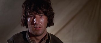 Movie still from “Little Big Man” (1970), directed by Arthur Penn – A person wearing a shirt; Close Up shot, Low angle