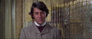 Movie still from “Little Big Man” (1970), directed by Arthur Penn – A person wearing a suit and tie; Close Up shot, Low angle
