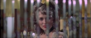 Movie still from “Little Big Man” (1970), directed by Arthur Penn – A person wearing a dress; Close Up shot, Over the shoulder angle