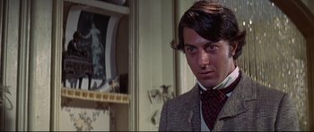 Movie still from “Little Big Man” (1970), directed by Arthur Penn – A person wearing a suit and tie; Close Up shot, Low angle