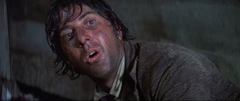 Movie still from “Little Big Man” (1970), directed by Arthur Penn – A person with wet hair; Close Up shot, Low angle