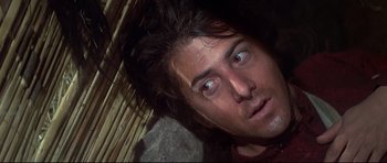 Movie still from “Little Big Man” (1970), directed by Arthur Penn – A man's eyes and forehead; Close Up shot, Low angle