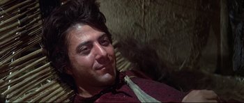 Movie still from “Little Big Man” (1970), directed by Arthur Penn – A person wearing a shirt and a tie; Close Up shot, Low angle