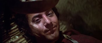 Movie still from “Little Big Man” (1970), directed by Arthur Penn – A person wearing a cowboy hat; Close Up shot, Low angle