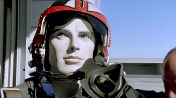 Movie still from “Little Dieter Needs to Fly” (1997), directed by Werner Herzog – A mannequin wearing a helmet; Close Up shot, Low angle