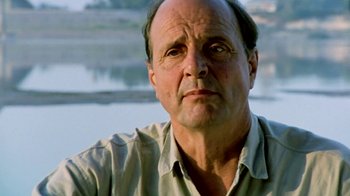 Movie still from “Little Dieter Needs to Fly” (1997), directed by Werner Herzog – An older man is looking at the camera; Close Up shot, Low angle