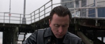 Movie still from “Little Odessa” (1994), directed by James Gray – A person wearing a leather jacket; Close Up shot, Low angle