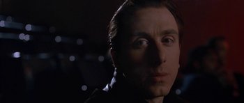 Movie still from “Little Odessa” (1994), directed by James Gray – A man's face in the dark; Close Up shot, Low angle