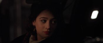 Movie still from “Little Odessa” (1994), directed by James Gray – A person wearing a white shirt; Close Up shot, High angle